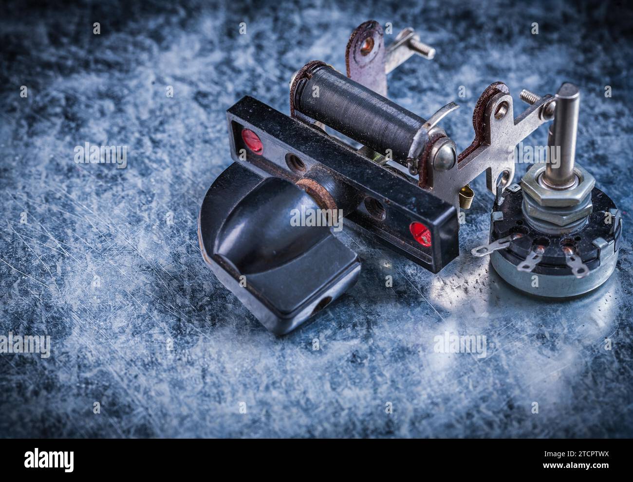 Electrical resistor toggle switch on scratched metallic background