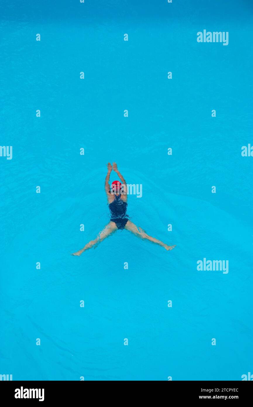 Swimmer in swimming pool, swimming, woman, water, water sports, pool, leisure, sport, breaststroke Stock Photo