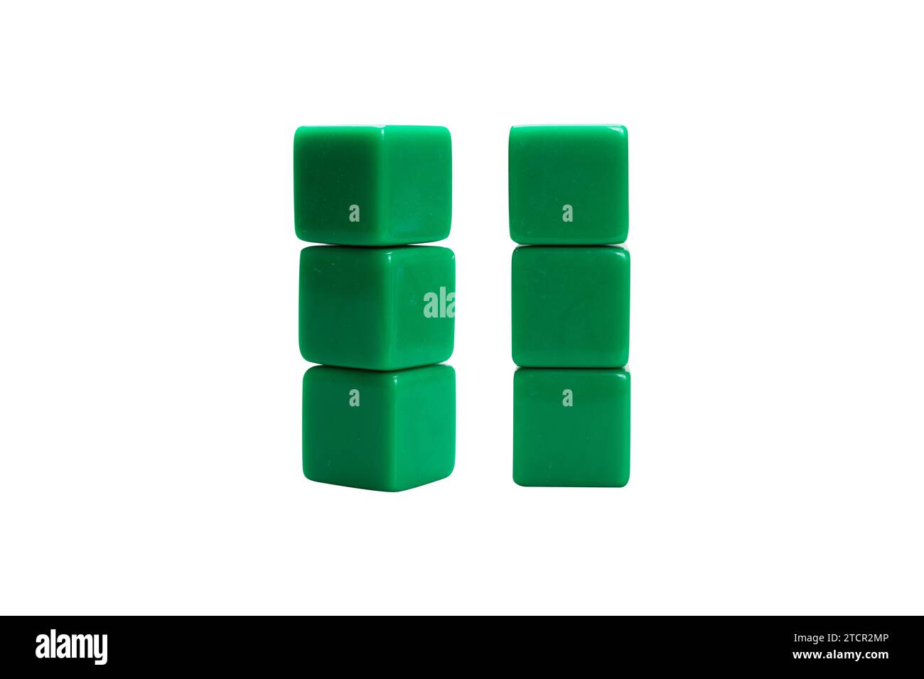 Closeup view of a stack of small cubes isolated over a white background ...