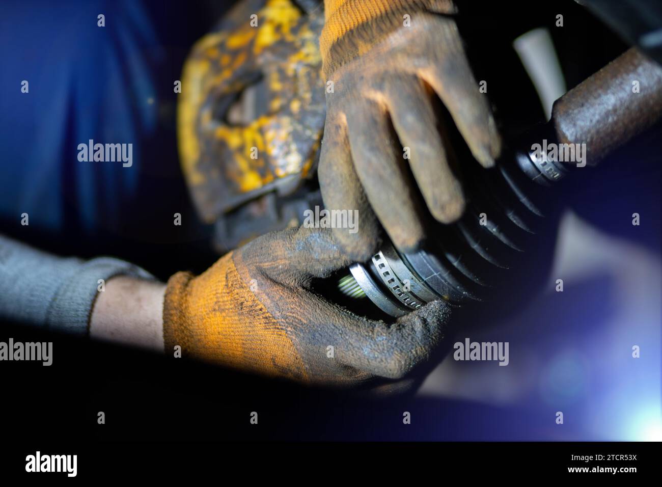 Replacing CV joint boot Stock Photo Alamy