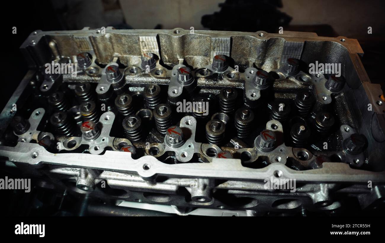 Cylinder head engine repair adjusting hydraulic compensators and valves