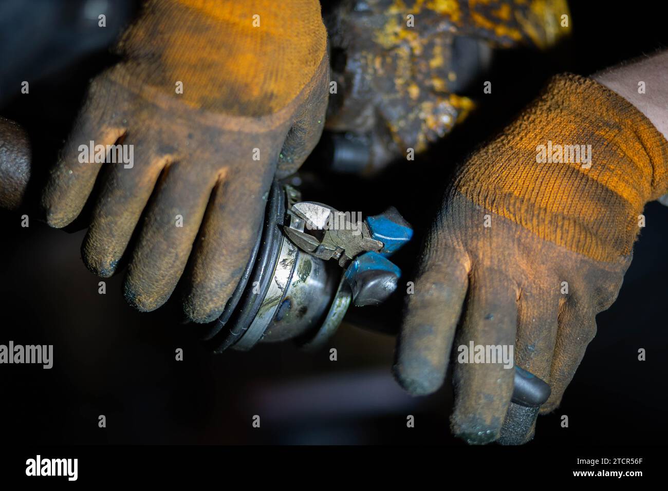 Replacing CV joint boot Stock Photo Alamy
