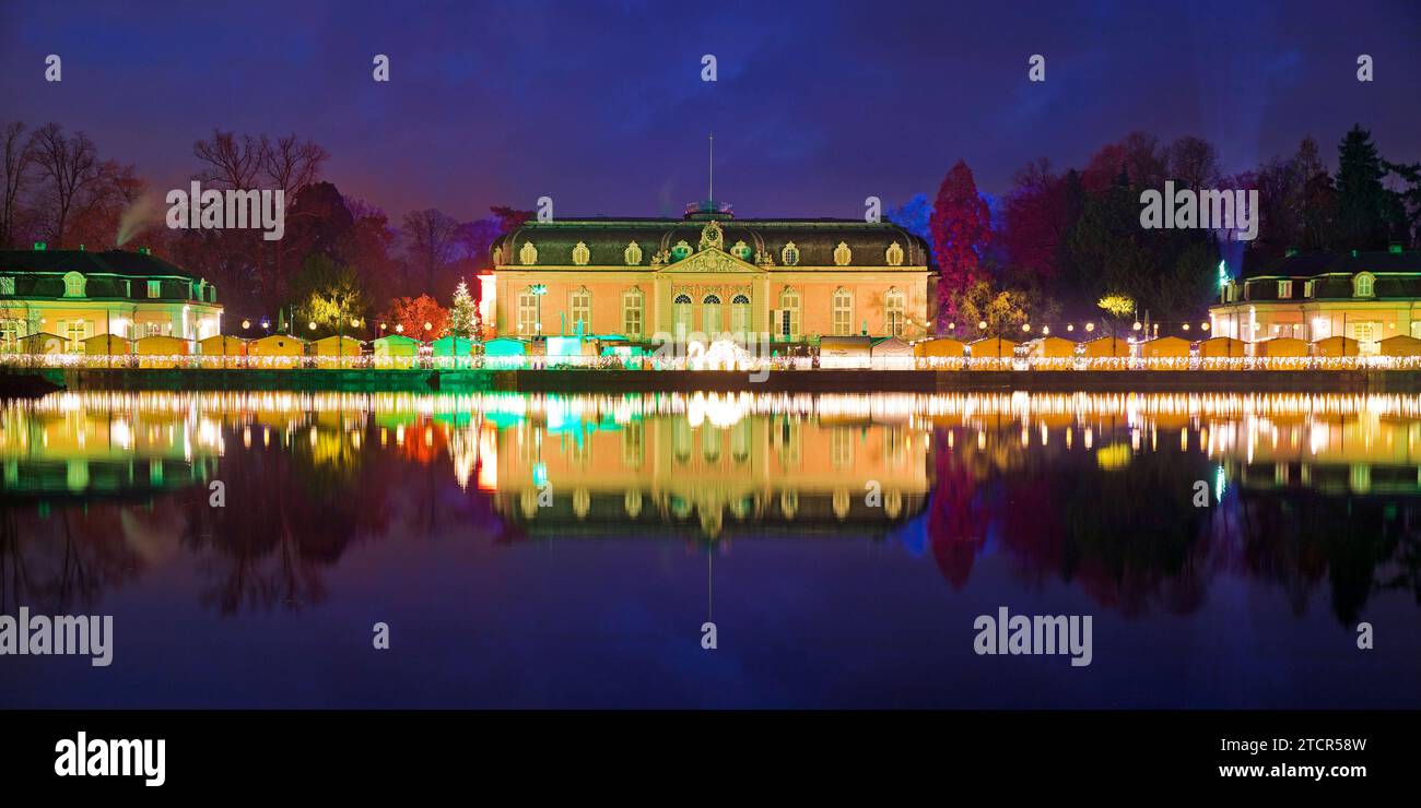 Illuminated Benrath Palace with wing building in the evening at Christmas Wunderwelt, Duesseldorf, North Rhine-Westphalia, Germany Stock Photo