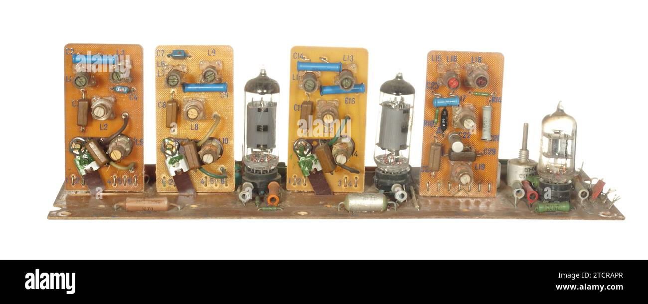 Interior of an obsolete tube radio isolated on white background Stock