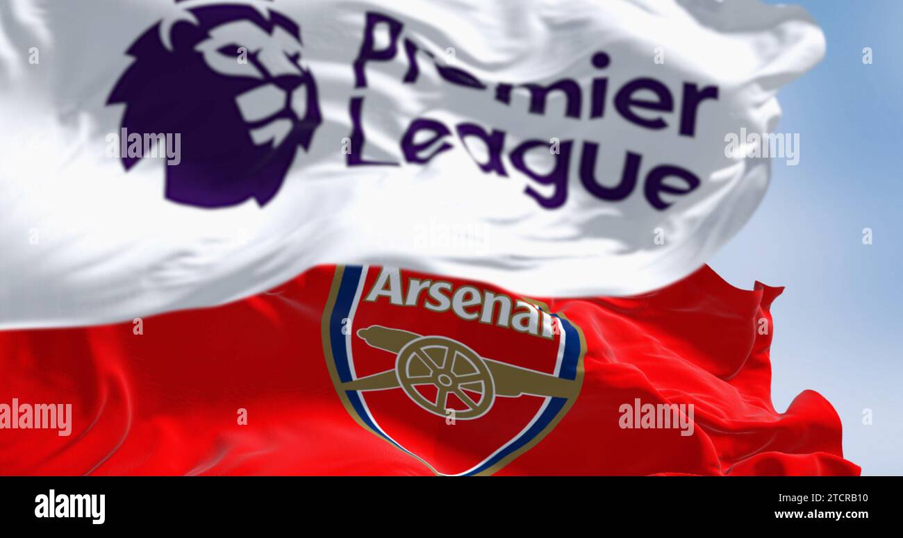 London, UK, July 18 2023: Arsenal Football Club and Premier League flags waving on a clear day. illustrative editorial 3d illustration render. Rippled Stock Photo