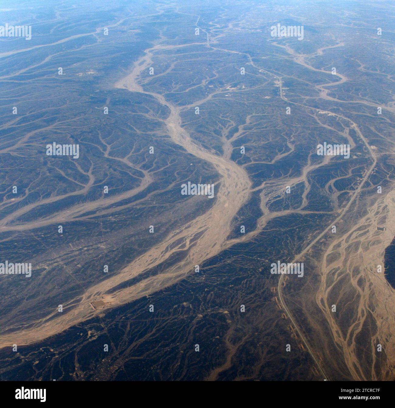A Surreal aerial view of dried river beds in the desert in Jordan near