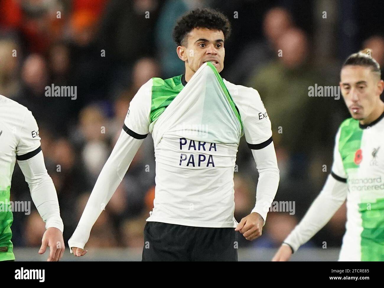 File photo dated 05-11-2023 of Liverpool's Luis Diaz (centre) celebrates scoring their side's first goal of the game by unveiling a shirt that reads (translated to English) 'Freedom for Dad'. Luis Diaz, still waiting for the release of his kidnapped father, came off the bench to save Liverpool from a shock defeat at Luton with a stoppage-time equaliser in a 1-1 draw. Issue date: Thursday December 14, 2023. Stock Photo