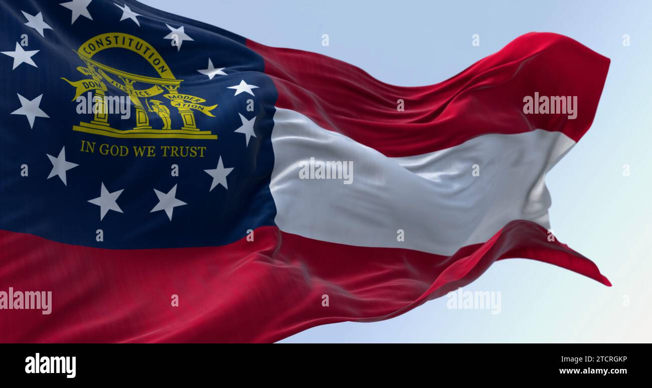 Close-up of Georgia state flag waving in the wind on a clear day. Red, white, red stripes. Blue canton with 13 stars and coat of arms. 3d illustration Stock Photo