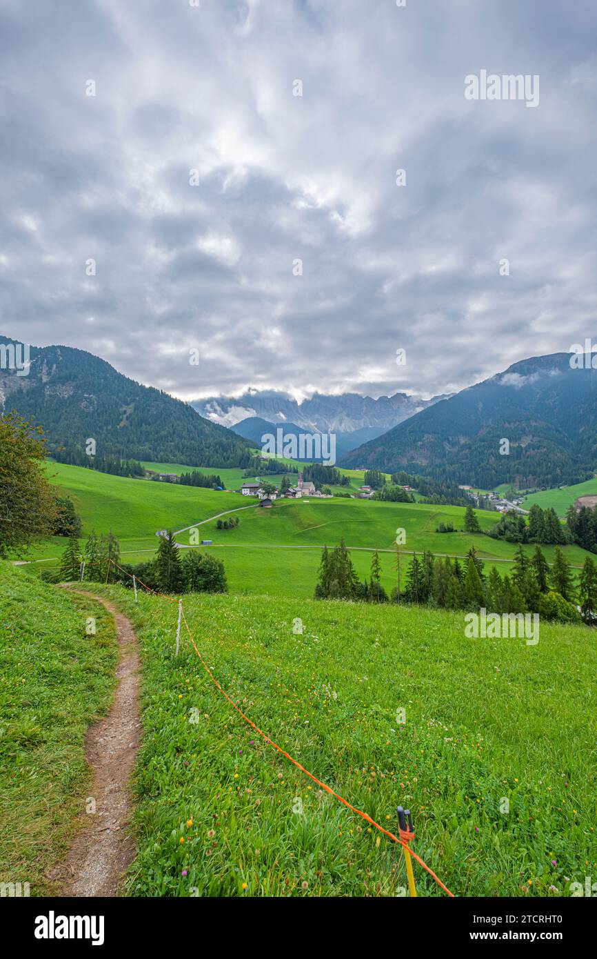 Santa Maddalena, Val di Funes, Alpine village, iconic church, meadows, forest trails, and Tyrolean charm showcase stunning scenery in this picturesque Stock Photo