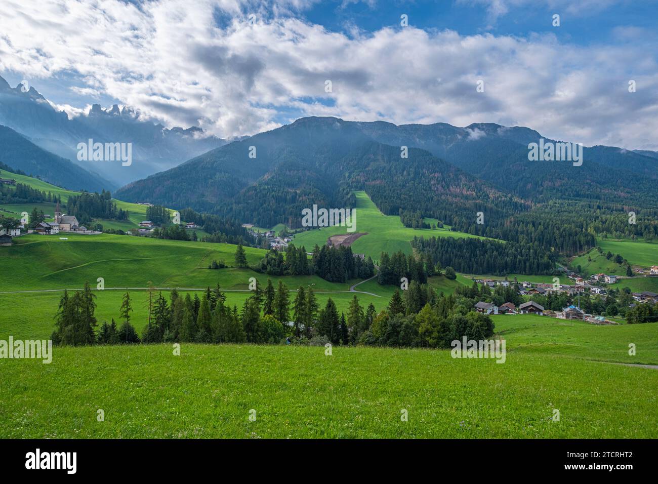 Santa Maddalena, Val di Funes, Alpine village, iconic church, meadows, forest trails, and Tyrolean charm. A picturesque setting with breathtaking scen Stock Photo
