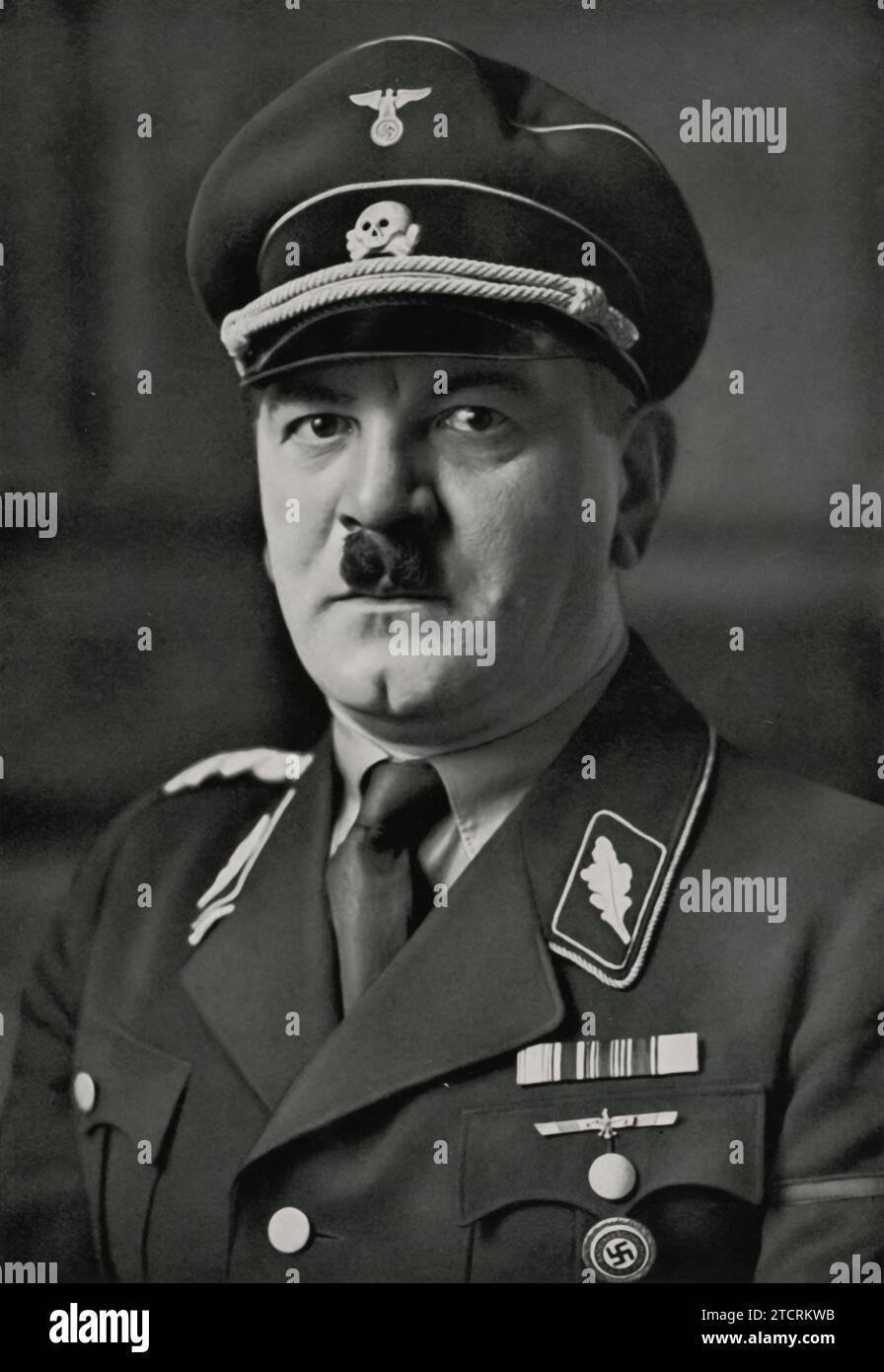 Photograph of Julius Schreck, dated May 16, 1936. Schreck, a notable figure in early Nazi history, was a close associate and personal chauffeur of Adolf Hitler. This image from 1936 captures him during a significant period in the Nazi regime, a time marked by the consolidation of power and expansion of its influence. Stock Photo