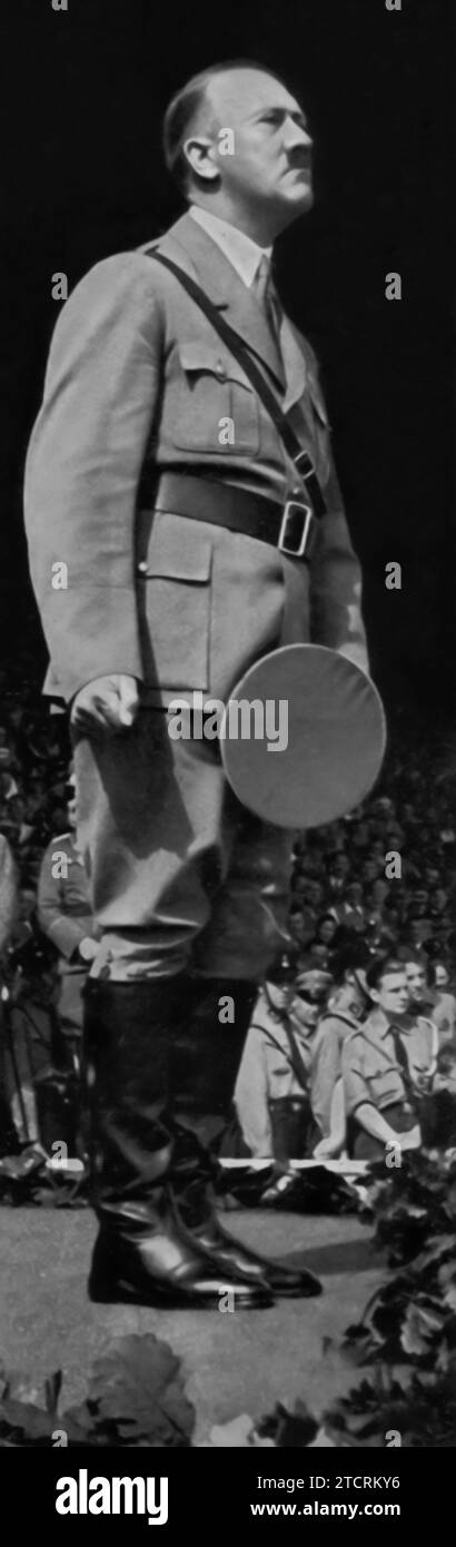 2/3. Adolf Hitler is shown making a speech in a composite image with multiple frames, each capturing him in various poses and expressions. This portrayal emphasizes his dynamic presence as a speaker and the intensity he brought to public addresses. The different frames illustrate the range of his oratorical style, from charismatic and engaging to intense and commanding. Such imagery was designed to underscore his effectiveness as a communicator and leader, pivotal in rallying support and promoting Nazi ideology. Stock Photo