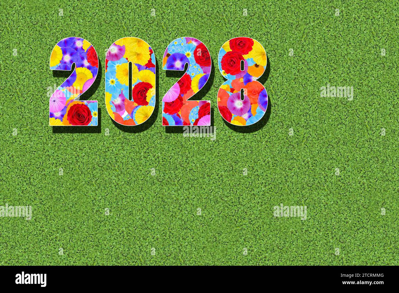 Year, year, calendar year 2028 written with colorful flowers on green background, graphic, computer montage, graphic design Stock Photo