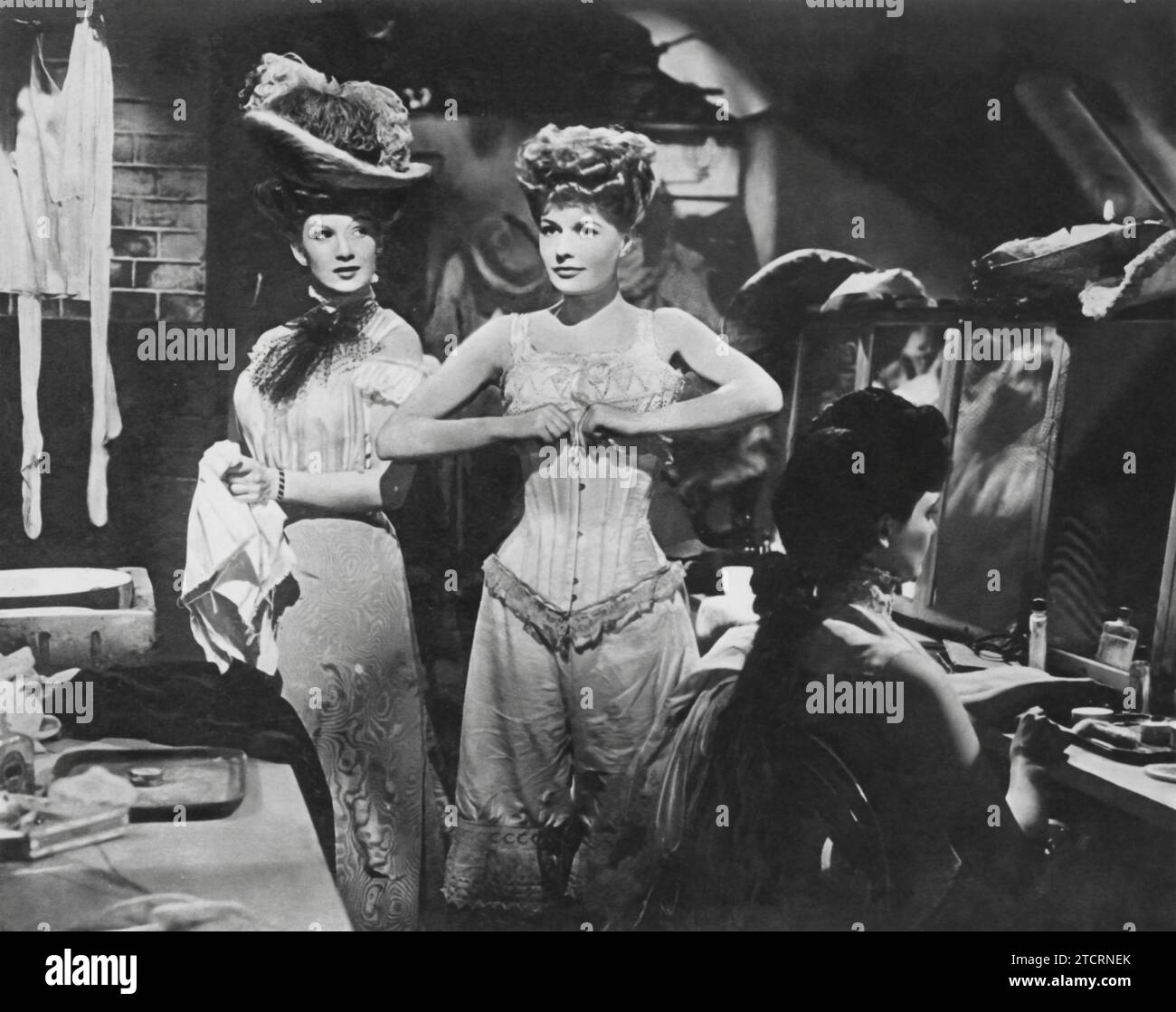 Sally Gray and Jean Kent star in 'Carnival' (1946). The film, set amidst the vibrant world of a traveling show, delves into the complexities of love and ambition. As their characters navigate the challenges of their environment, secrets unravel and relationships are tested, making 'Carnival' a captivating portrayal of life behind the scenes. Stock Photo