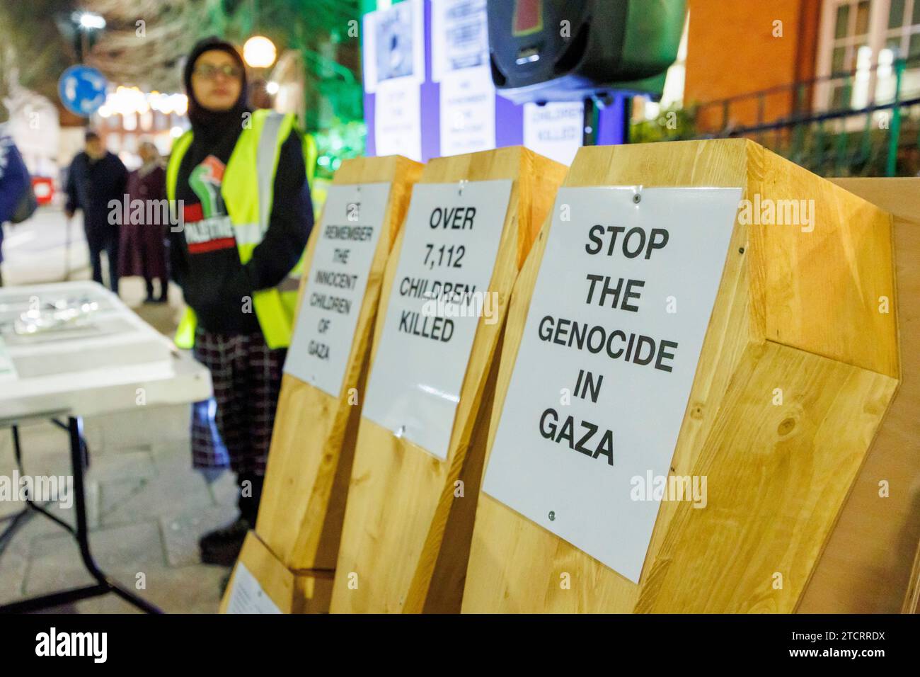 Palestine demonstration outide Nuneaton Town Hall. People gathered in Nuneaton Town Centre in support of the Palestine people. Six small wooden coffins were on display to represent the many children killed in the conflict with Israel. The meeting was peacefull. Stock Photo