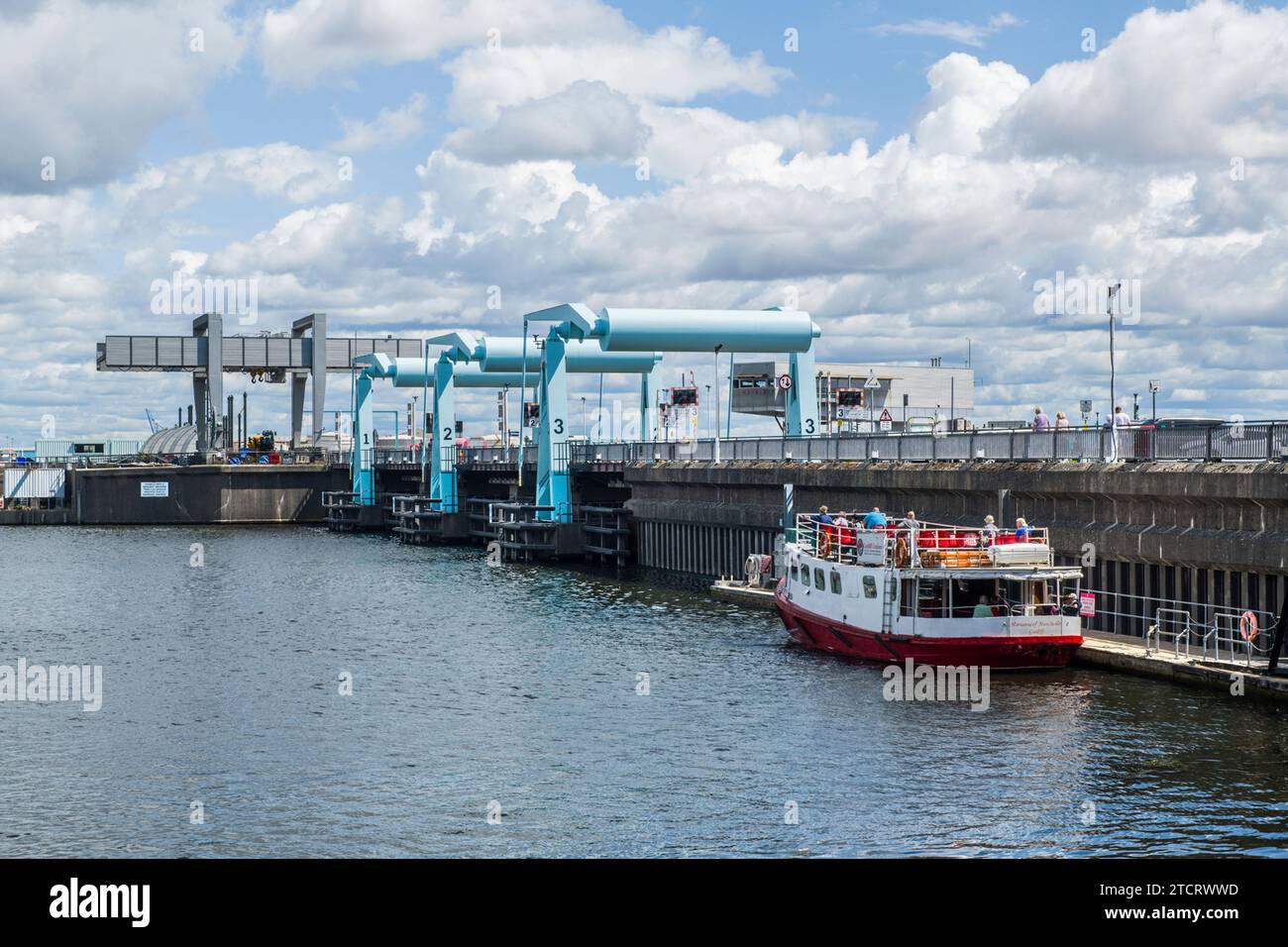 Cardiff Bay Barrage and Bascule Bridges with cruise boat in lakeside in