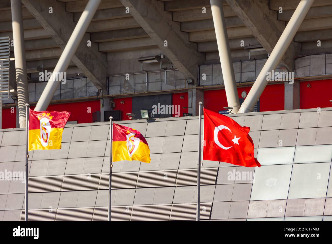 Galatasaray flags with Flag of Turkiye and Galatasaray stadium on the background. Istanbul Turkiye - 10.28.2023 Stock Photo