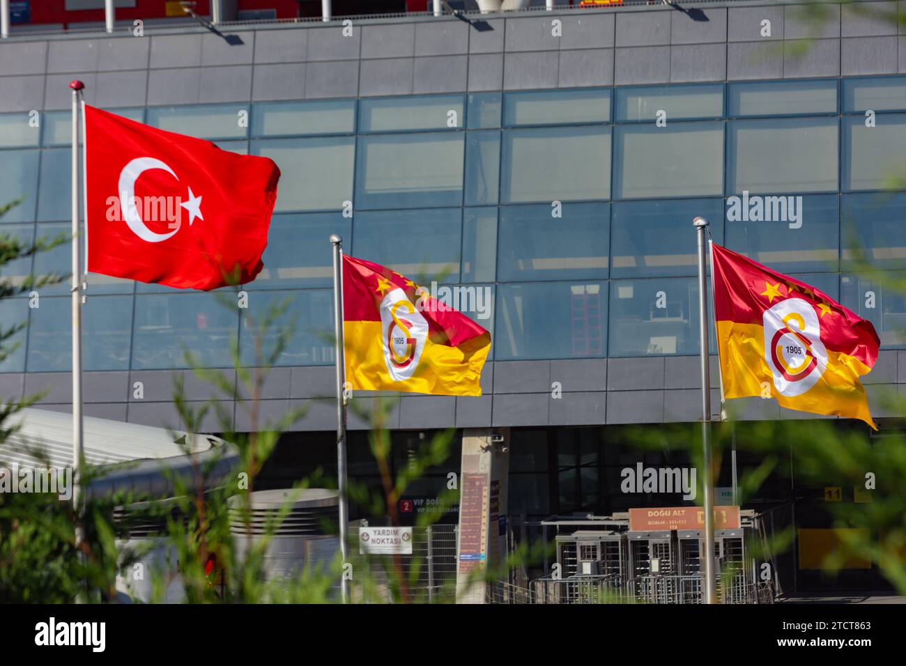 Galatasaray and Turkish Flags on the flagpole. Istanbul Turkiye - 10.28.2023 Stock Photo