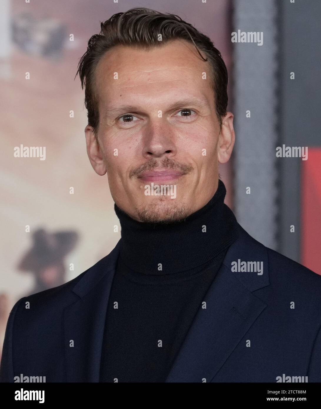 Tomm Voss arrives at the Netflix's REBEL MOON - PART ONE: A CHILD OF FIRE Los Angeles Premiere held at the TCL Chinese Theatre in Hollywood, CA on Wednesday, ?December 13, 2023. (Photo By Sthanlee B. Mirador/Sipa USA) Stock Photo