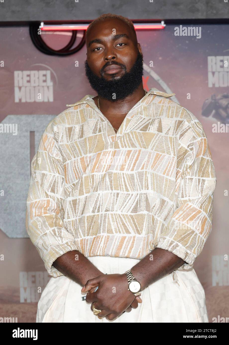 HOLLYWOOD, CA - DECEMBER 13: Abraham Popoola at the LA Premiere of