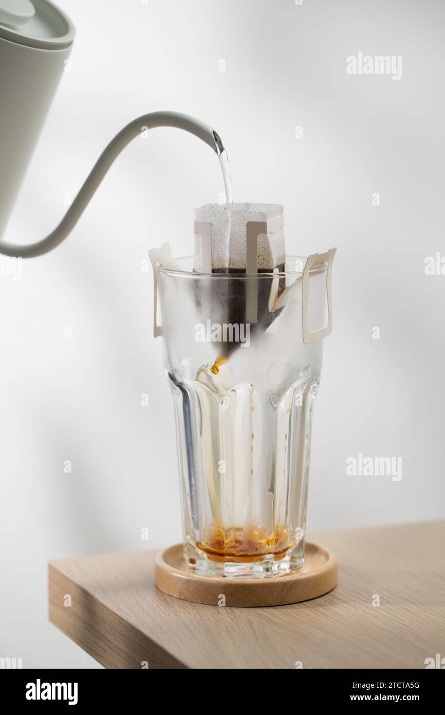 Coffee drip bag. The hot water is poured over the roasted and ground