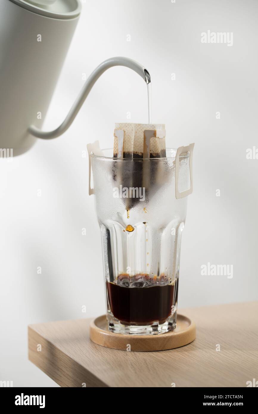 Coffee drip bag. The hot water is poured over the roasted and ground