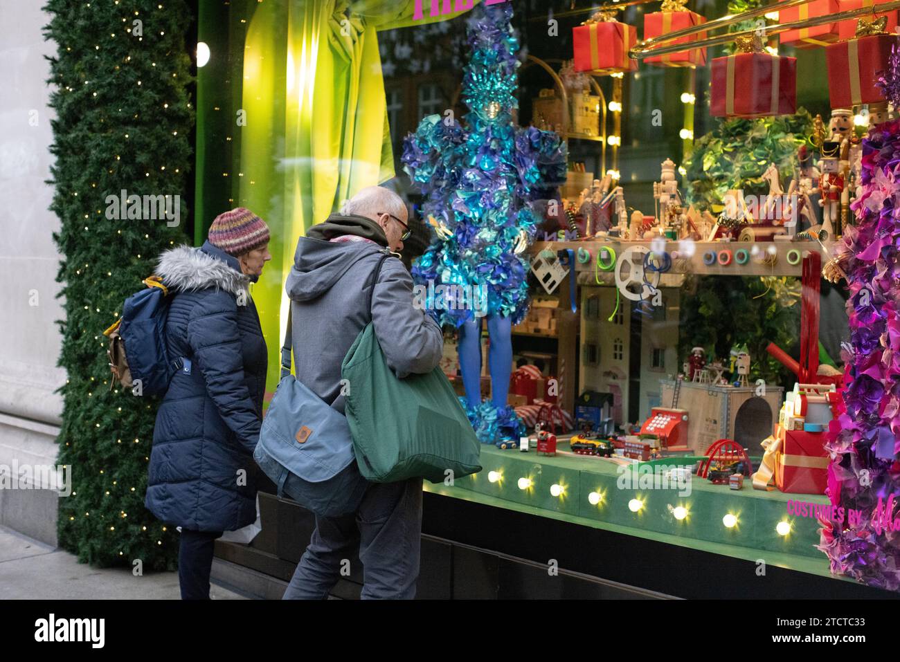 Christmas tourists enjoying Selfridges luxury department store on