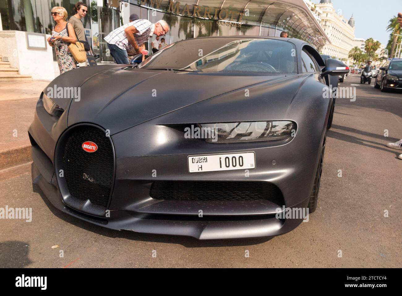 Bugatti Chiron Sport 110 Ans sports car / super car supercar, being admired by locals and tourists while parked Bd boulevard de la Croisette, 06400 Cannes. France. (135) Stock Photo