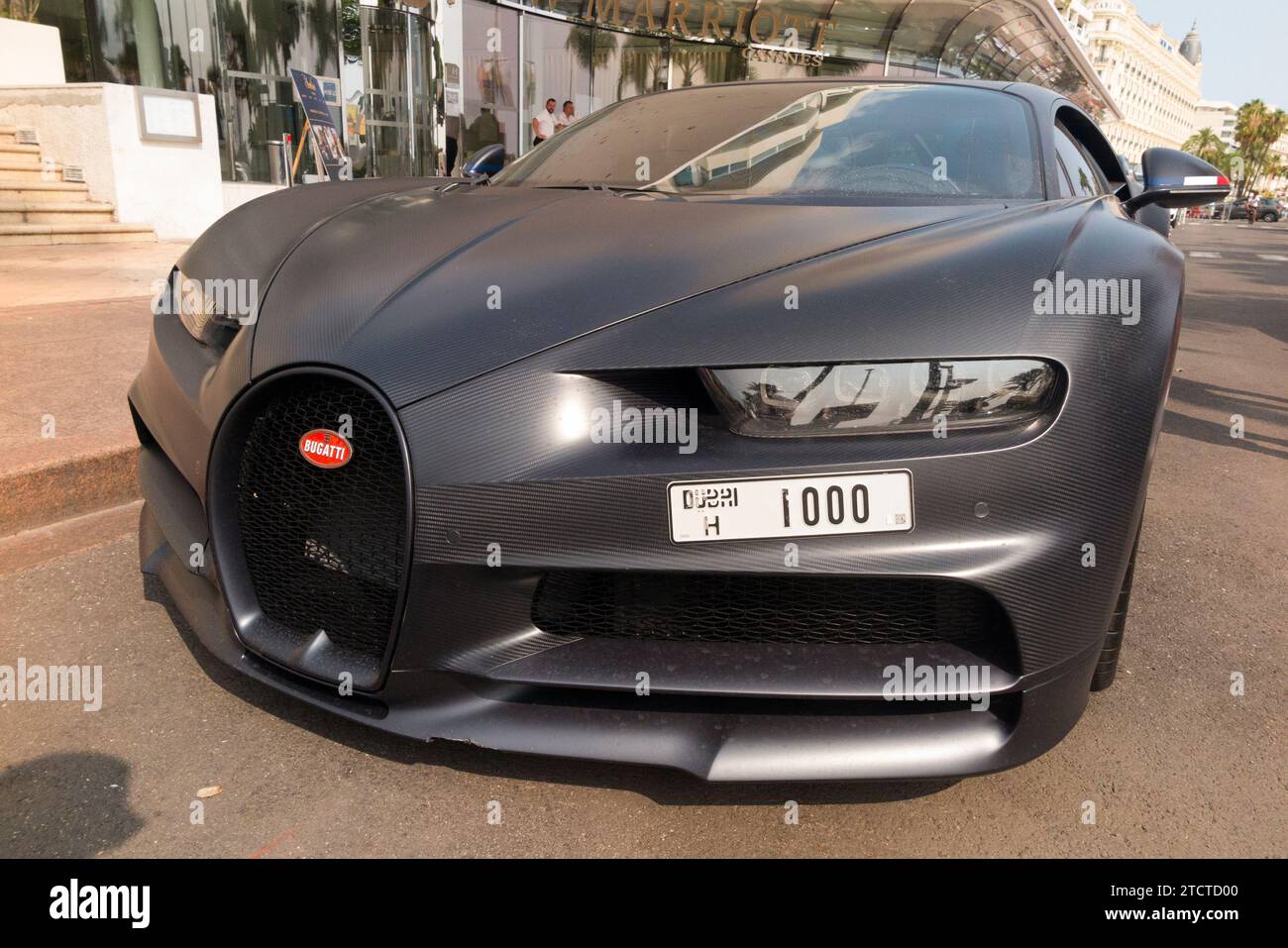 Bugatti Chiron Sport 110 Ans sports car / super car supercar, being admired by locals and tourists while parked Bd boulevard de la Croisette, 06400 Cannes. France. (135) Stock Photo