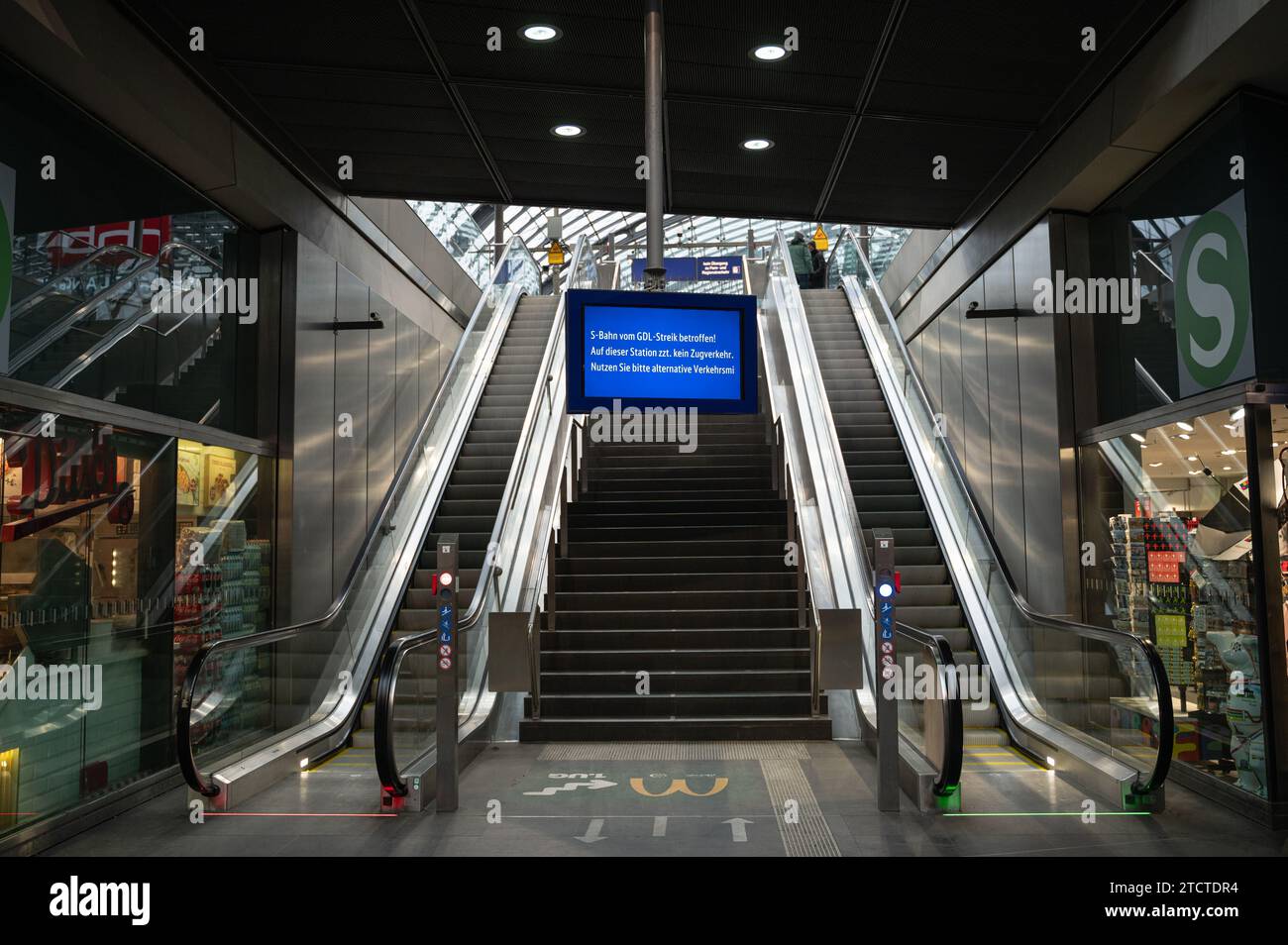 08.12.2023, Berlin, Germany, Europe - Berlin, Germany, Europe - An almost deserted Berlin Central Railway Station with escalators during a strike. Stock Photo