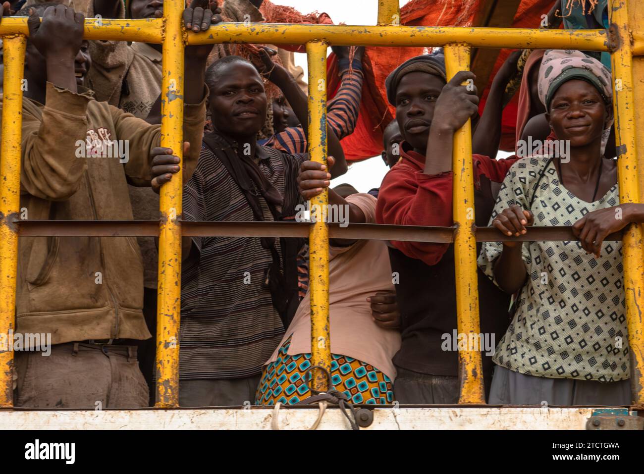 Workers back from the sugar cane plantation after a work day Stock Photo