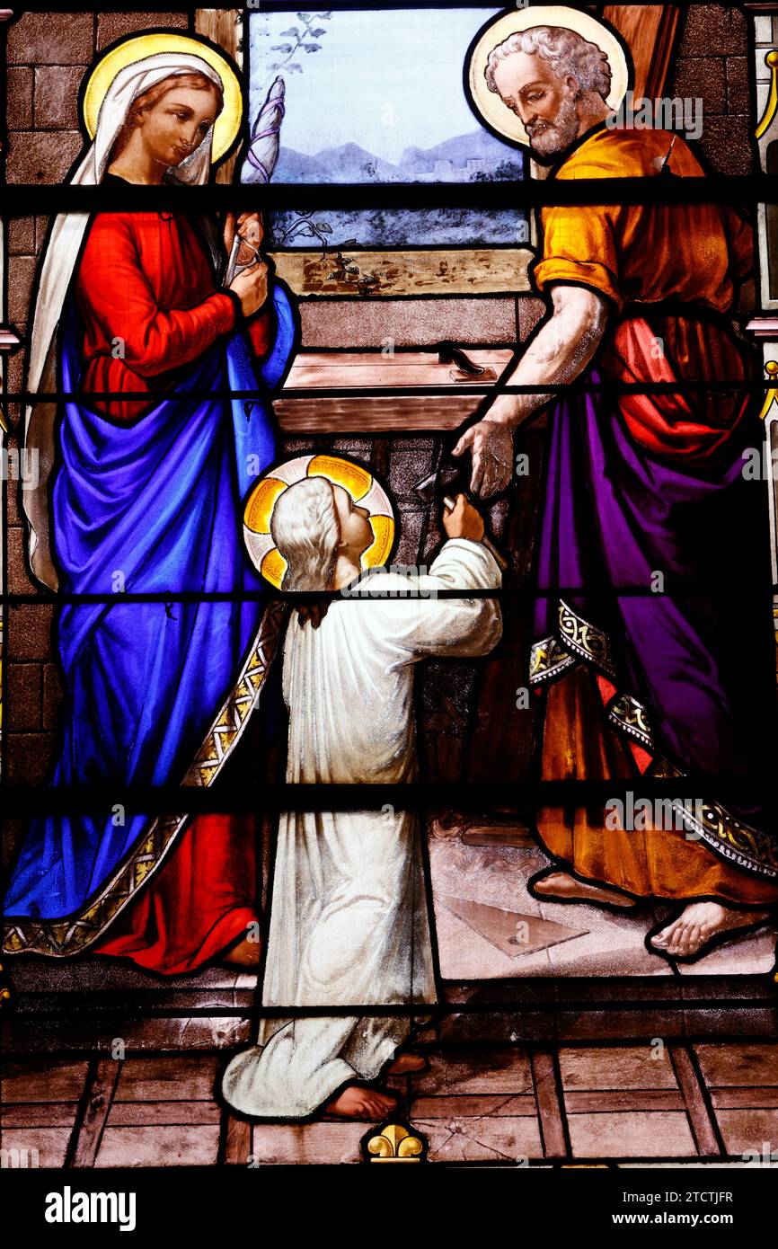 Saint Aubin church.  Stained glass. Holy Family. Joseph the carpenter. Houlgate. France. Stock Photo