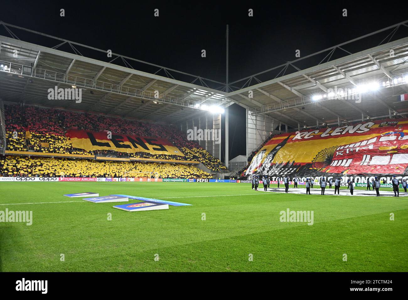 fans and supporters of Lens having a giant Tifo banner during the Uefa Champions League matchday 6 game in group B in the 2023-2024 season between Racing Club de Lens and FC Sevilla on December 12 , 2023 in Lens, France. (Photo by David Catry / Isosport) Stock Photo