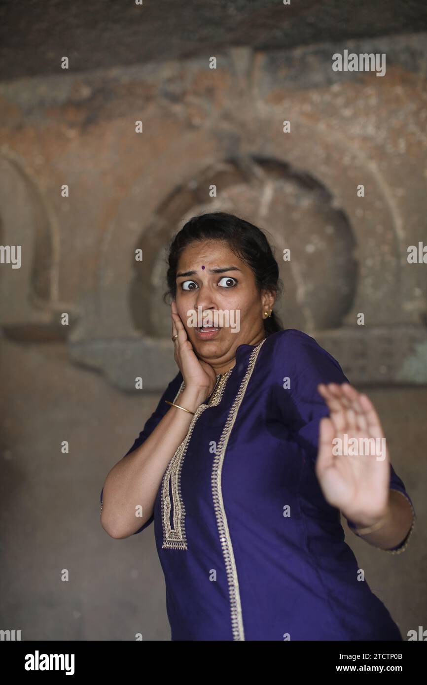 Indian dancer performing in Ajanta caves, Maharashtra, India Stock