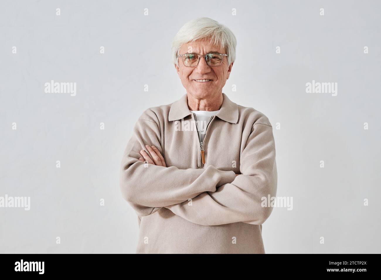 Cheerful man crossed arms hi-res stock photography and images - Alamy