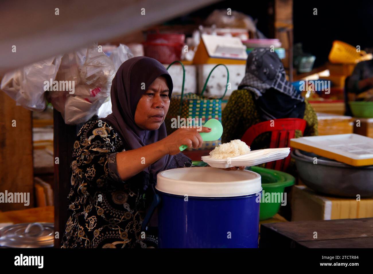 People Selling Rice Muslim woman selling hi-res stock photography and images - Alamy