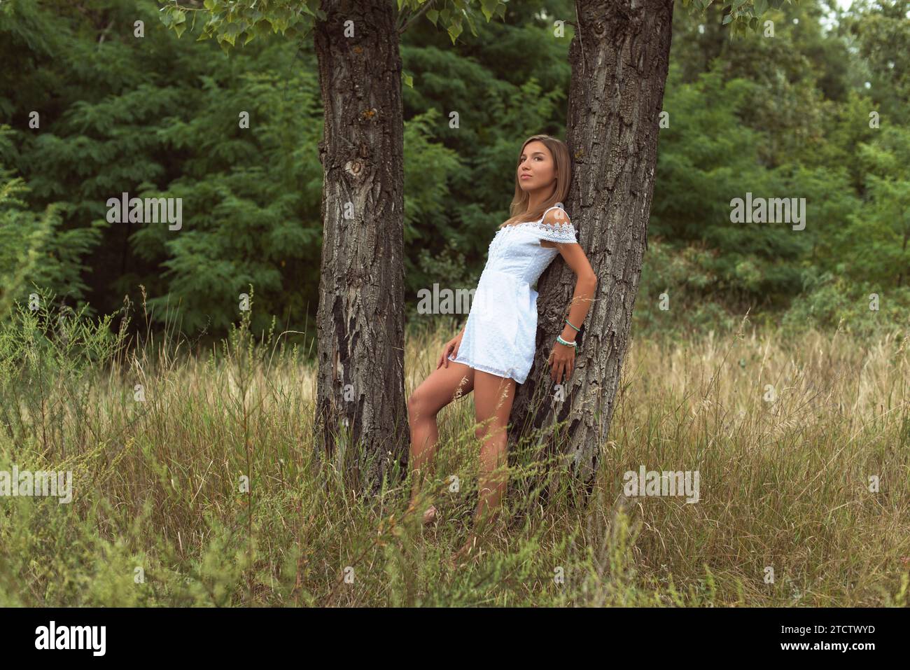 Wild river purenudism photo - Model standing gracefully in the river stream.