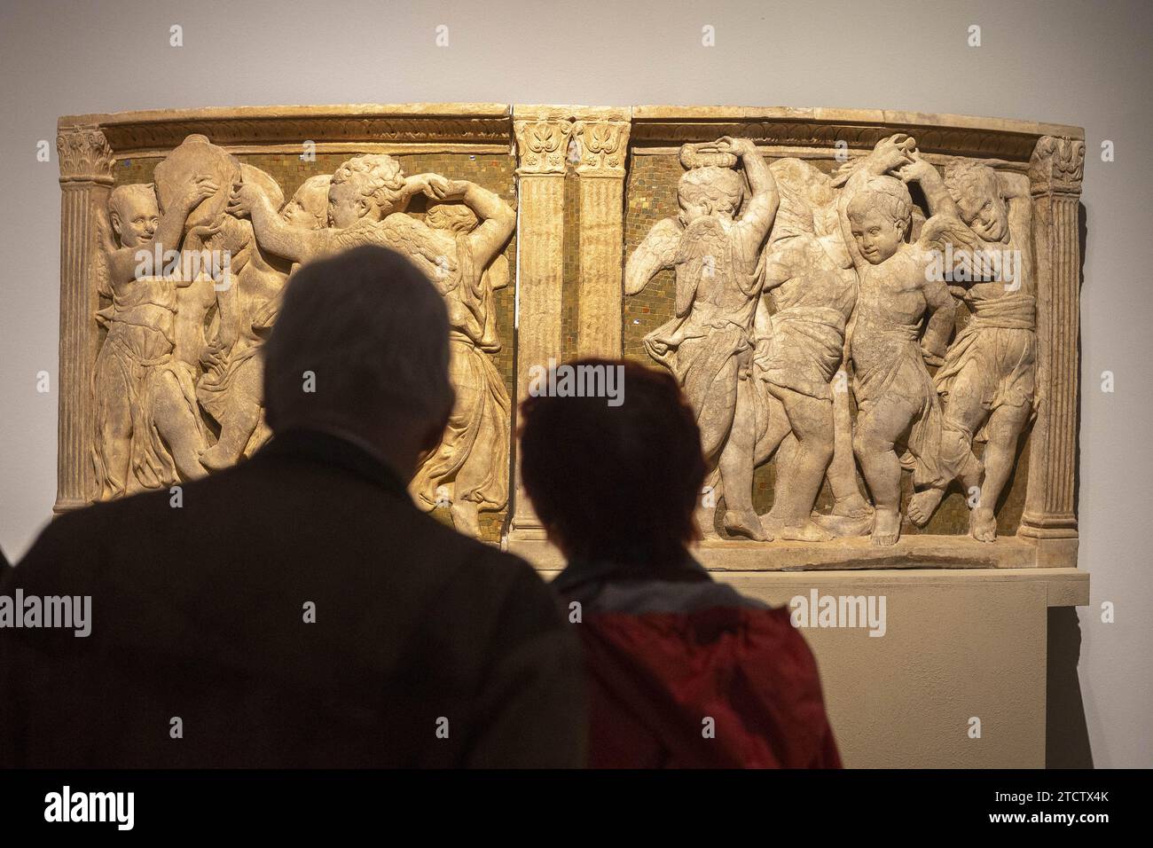 Donatello exhibition at the V&A museum, London, U.K. Donatello & Michelozzo di Bartolomeo, Two panels with dancing spiritelli and a pilaster from the Stock Photo