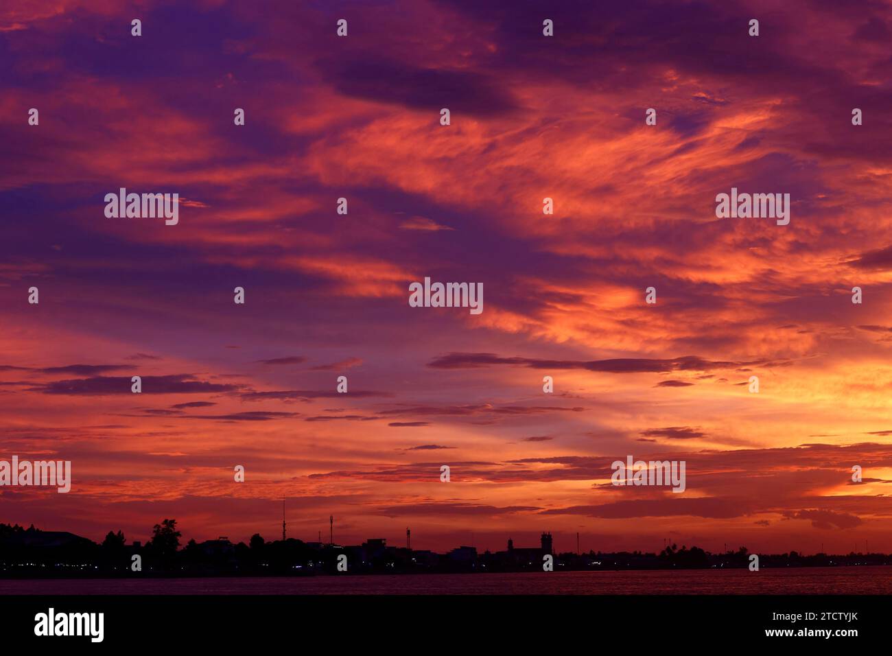 Orange clouds and sky at sunset. Stock Photo