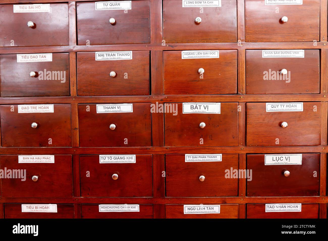 Traditional vietnamese phramacy.   Wooden drawers for medicines. Stock Photo