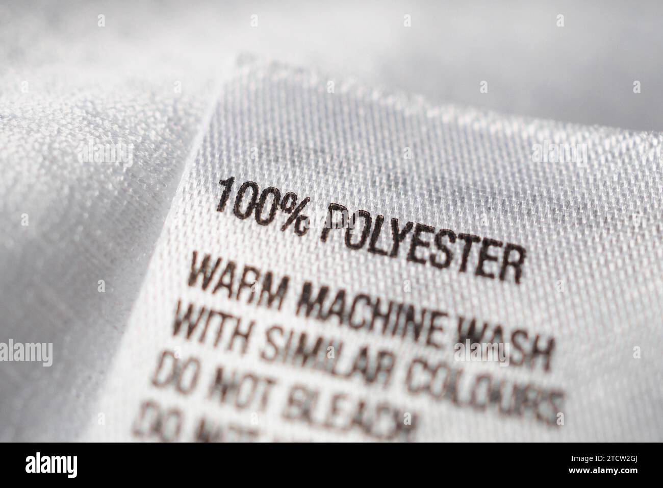 Polyester fabric Clothing label with laundry instructions Stock Photo