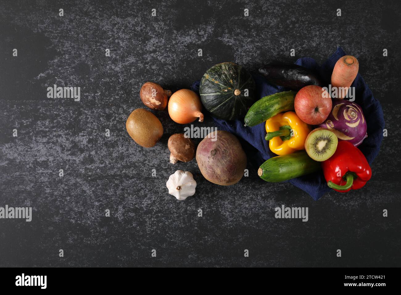 Vegetable ingredients on cement background Stock Photo
