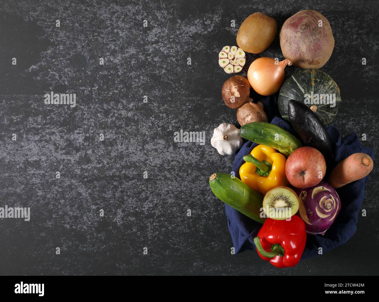 Vegetable ingredients on cement background Stock Photo