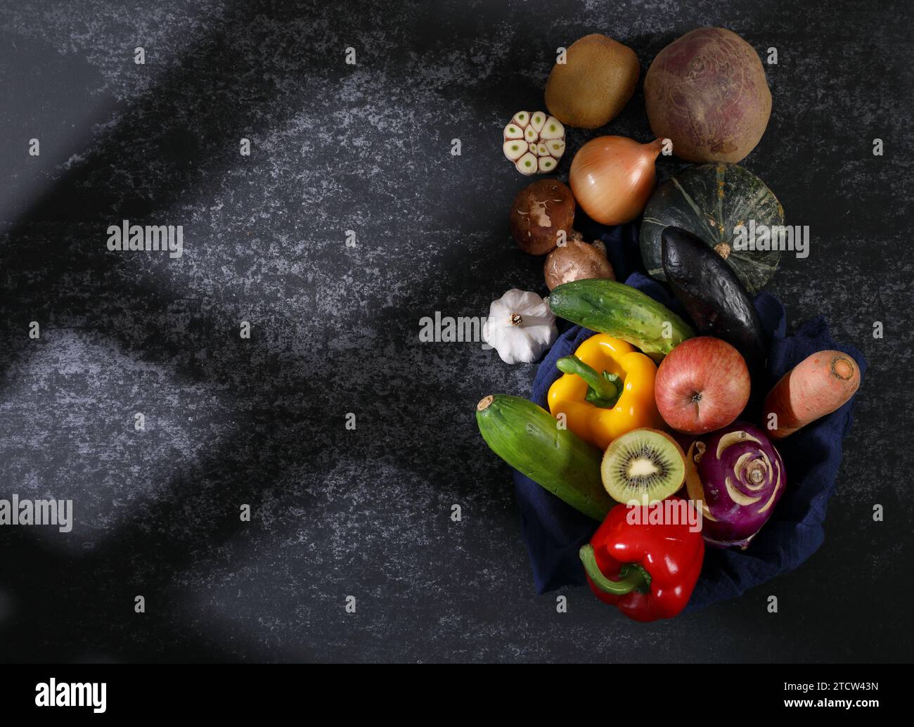 Vegetable ingredients on cement background Stock Photo