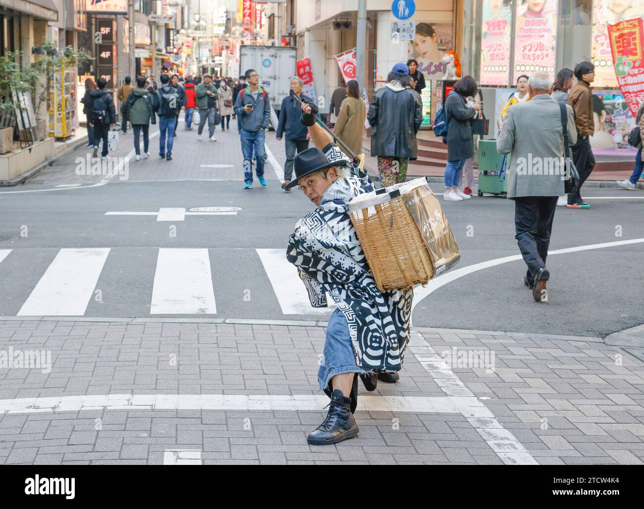 SAMURAI WHO PICK UP LITTER IN SHIBUYA STREETS TOKYO Stock Photo