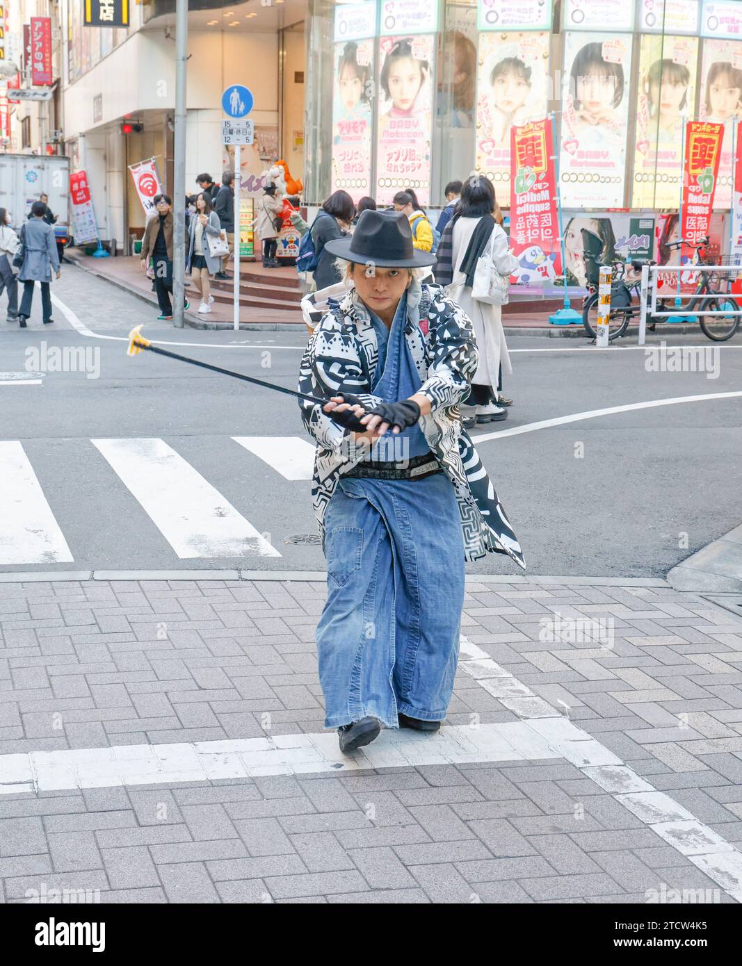 SAMURAI WHO PICK UP LITTER IN SHIBUYA STREETS TOKYO Stock Photo