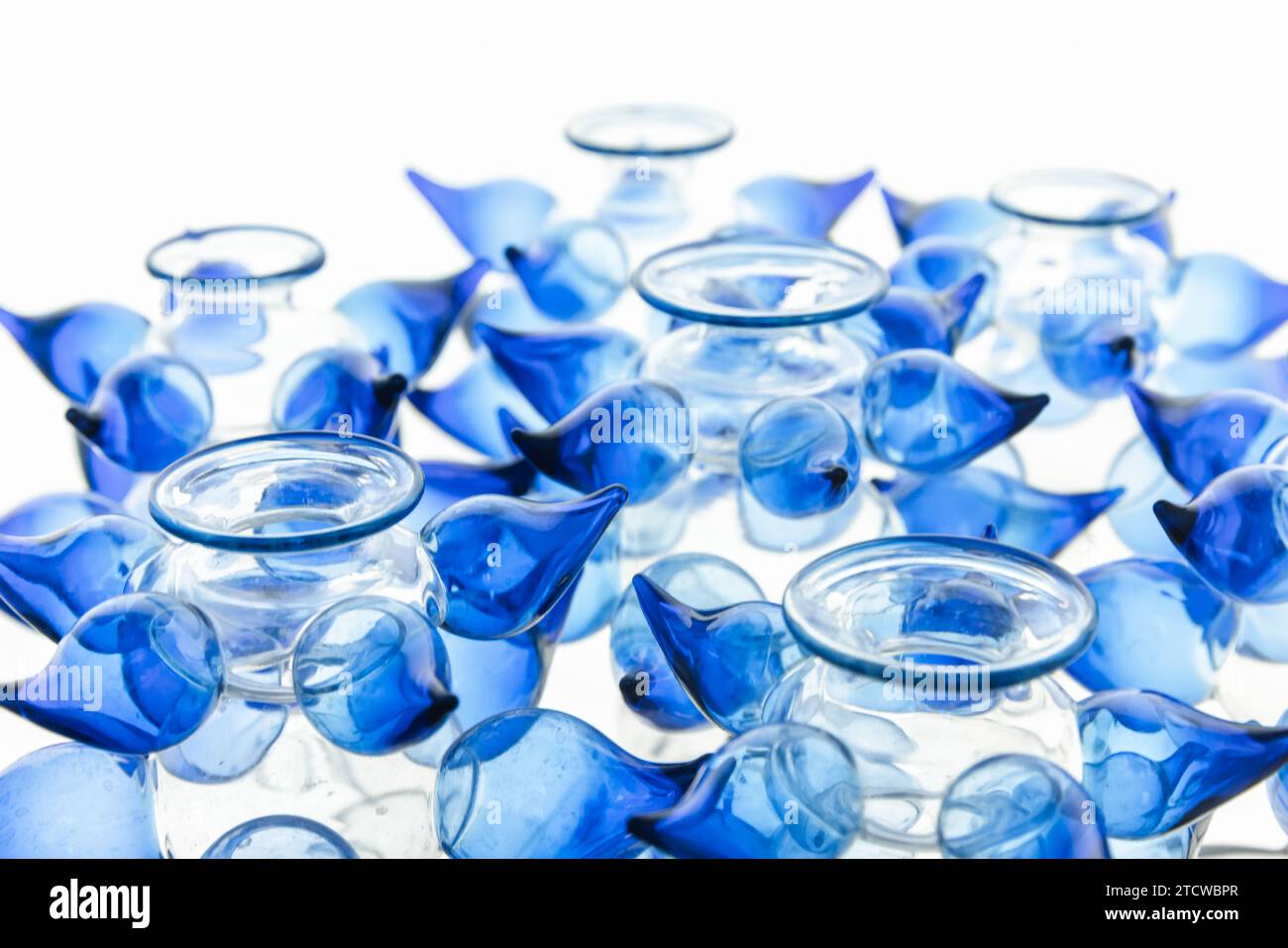 Abstract glass installation, empty blue vases close up photo with