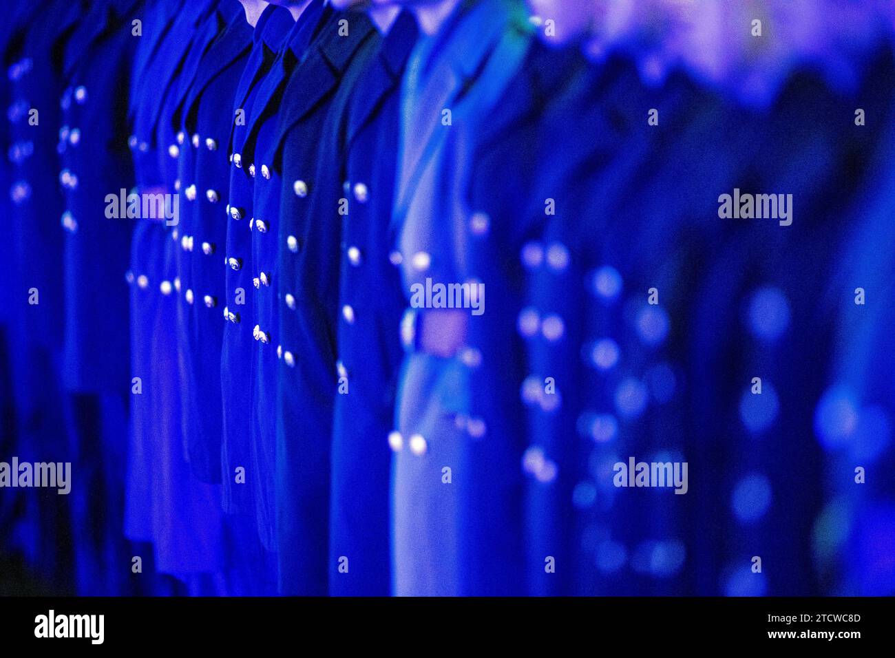 Stralsund, Germany. 14th Dec, 2023. Bundeswehr recruits stand in the harbor during the swearing-in ceremony. 145 new soldiers from the Parow Naval Academy have been sworn in. Credit: Stefan Sauer/dpa/Alamy Live News Stock Photo