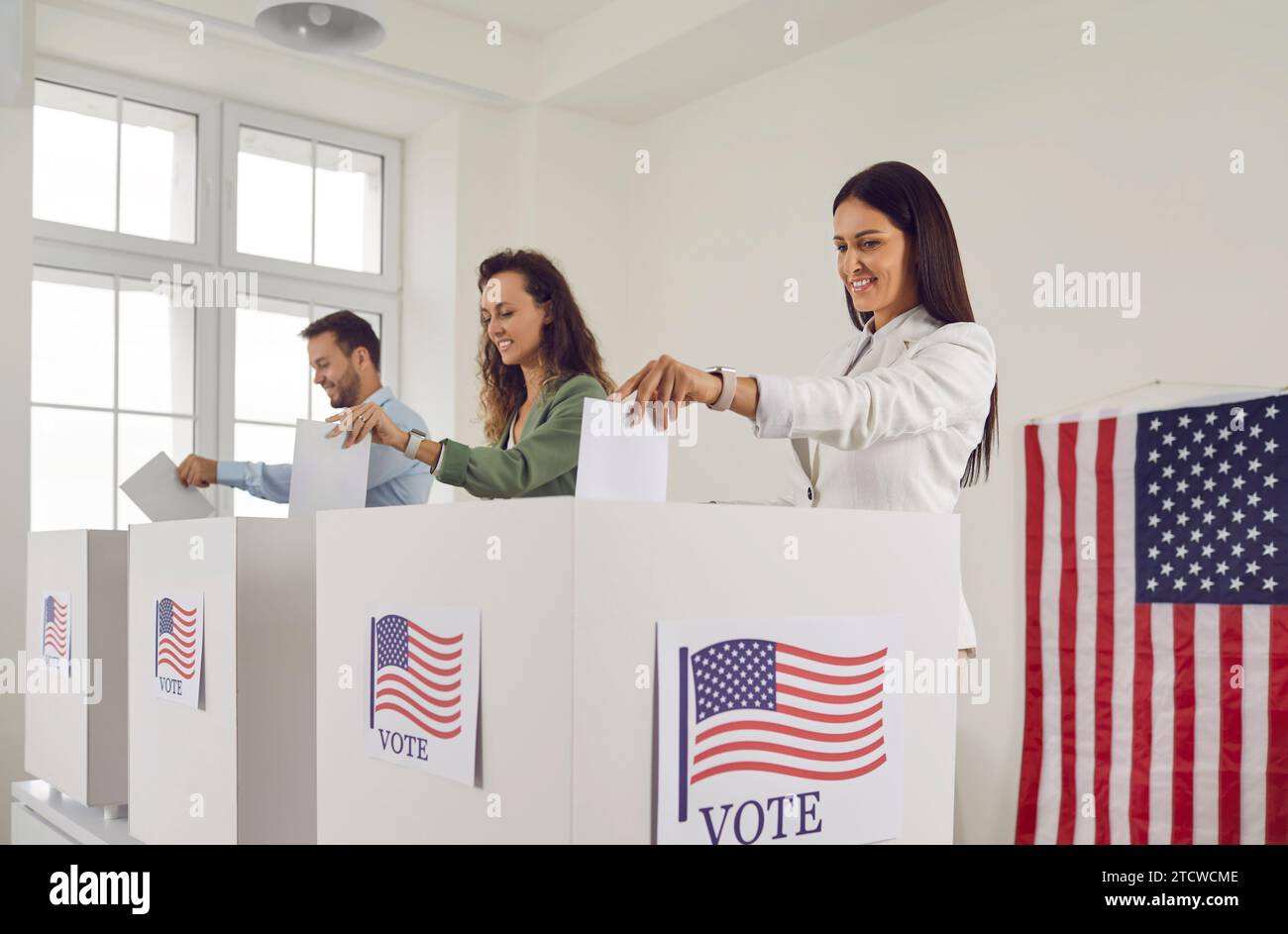 Voting smiling politics hi-res stock photography and images - Alamy