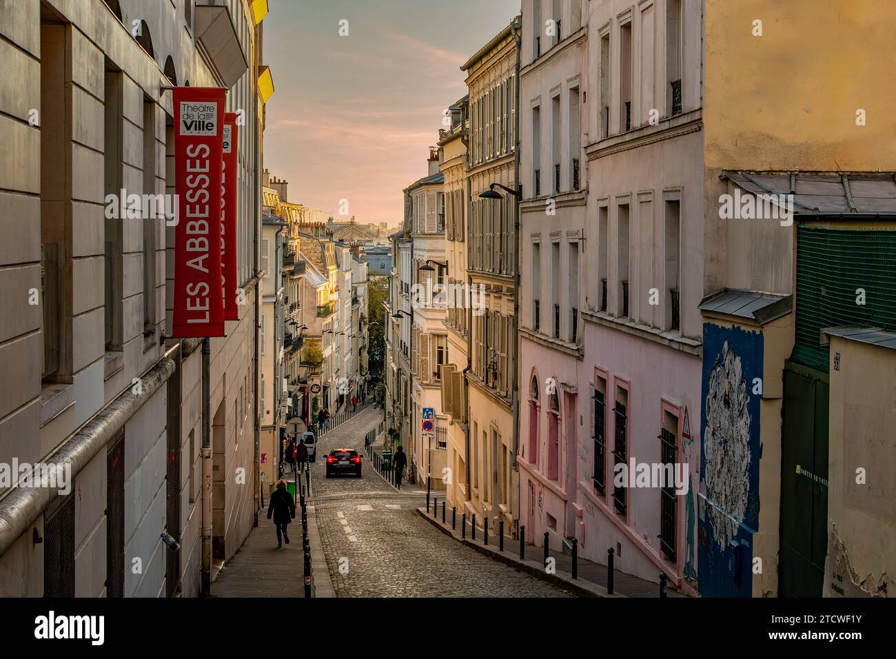 Late afternoon winter sunshine reflecting along Rue Germain Pilon in Montmartre, located  in the 18th arrondissement of Paris ,France Stock Photo